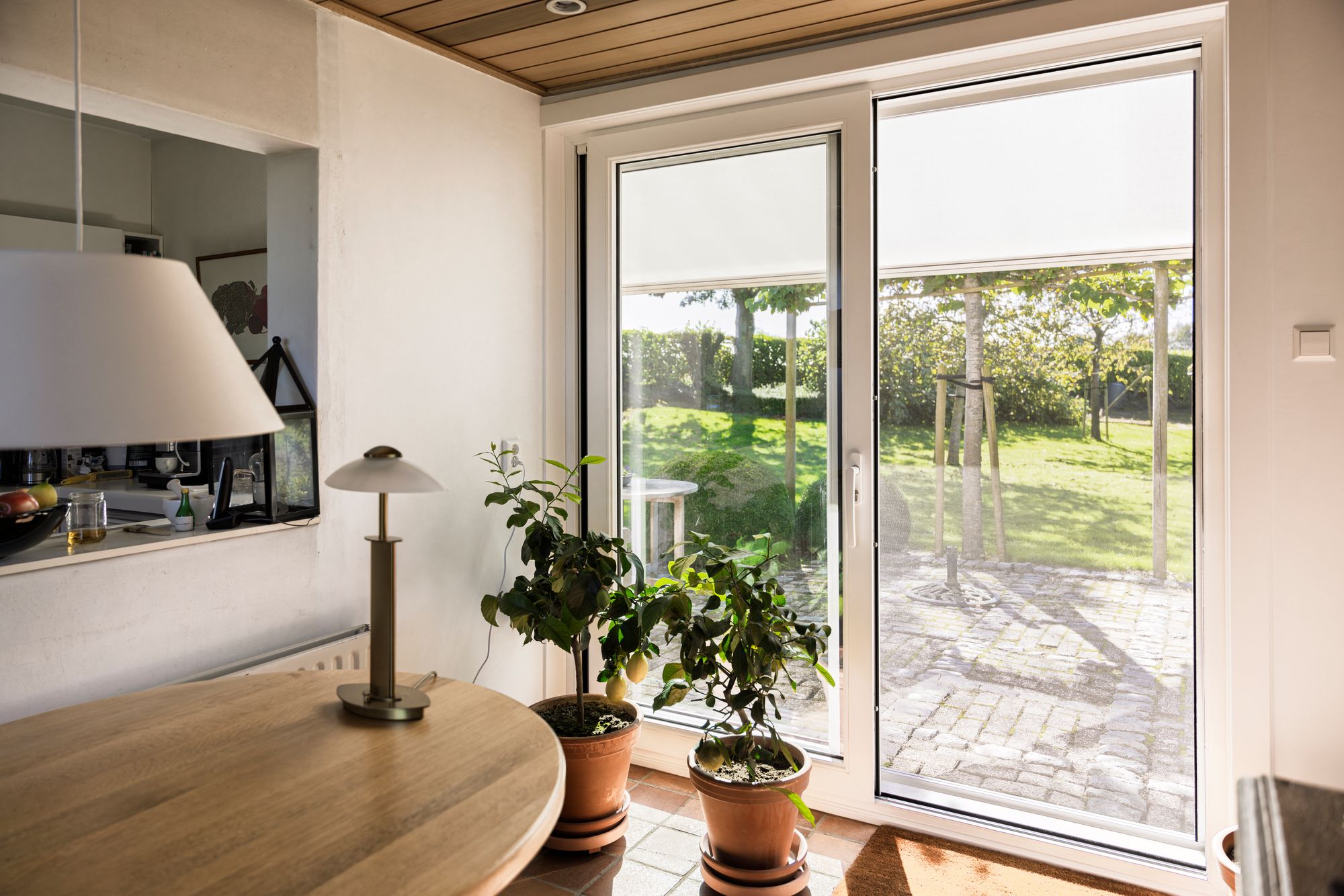 Kunststof schuifpui met houtlook